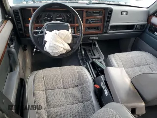 1996 Jeep Cherokee Country with VIN 1J4FJ78S7TL242853, listed as a Copart auction lot 73022554 with 84,868 mi miles and Salvage Title. Bid and sale history available at carsss.com. Image 8.