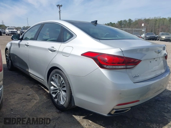 2017 Genesis G80 3.8L z VIN KMHGN4JE4HU175417, wystawiony jako IAAI lot #41818684 z przebiegiem 83 658 mil mil oraz . Historia ofert i sprzedaży dostępna na DreamBid. Obrazek 3.