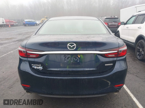2021 Mazda 6 Touring with VIN JM1GL1VM4M1616243, listed as a IAAI auction lot 41907100 with 59,315 mi miles and . Bid and sale history available at carsss.com. Image 16.