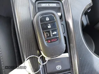 2025 Honda Civic Sport with VIN 2HGFE2F55SH529311, listed as a IAAI auction lot 41898987 with 2,873 mi miles and . Bid and sale history available at DreamBid. Image 11.