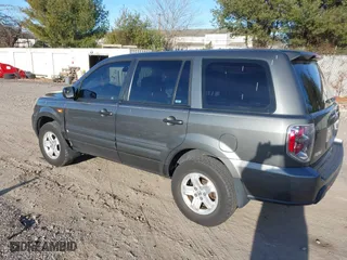 2007 Honda Pilot LX with VIN 2HKYF18197H504905, listed as a IAAI auction lot 41293667 with 200,448 mi miles. Bid and sale history available at carsss.com. Image 3.