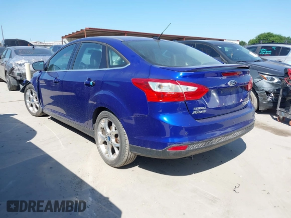 2013 Ford Focus Titanium with VIN 1FADP3J25DL163591, listed as a IAAI auction lot 41973388 with 133,071 mi miles and . Bid and sale history available at carsss.com. Image 3.