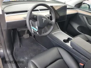 2024 Tesla Model Y with VIN 7SAYGDED1RF052031, listed as a Copart auction lot 48507865 with 5,365 mi miles and Salvage title. Bid and sale history available at DreamBid. Image 8.