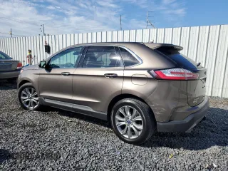 2019 Ford Edge Titanium with VIN 2FMPK4K99KBC31259, listed as a Copart auction lot 63067555 with 86,629 mi miles and Salvage title. Bid and sale history available at DreamBid. Image 2.