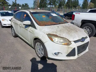 2012 Ford Focus SE with VIN 1FAHP3K23CL251716, listed as a IAAI auction lot 42036099 with 119,600 mi miles. Bid and sale history available at carsss.com. Image 1.