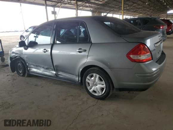 2011 Nissan Versa S with VIN 3N1BC1AP8BL470853, listed as a Copart auction lot 53004485 with 172,794 mi miles and Salvage title. Bid and sale history available at DreamBid. Image 2.