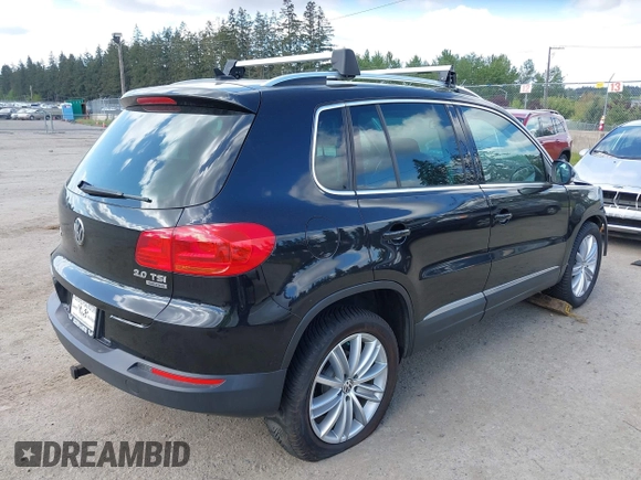 2012 Volkswagen Tiguan SE with VIN WVGBV7AX5CW561368, listed as a IAAI auction lot 42197389 with 63,809 mi miles and . Bid and sale history available at DreamBid. Image 4.