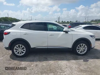 2021 Buick Envision Preferred with VIN LRBAZLR44MD073242, listed as a IAAI auction lot 41947075 with 31,335 mi miles and . Bid and sale history available at DreamBid. Image 13.