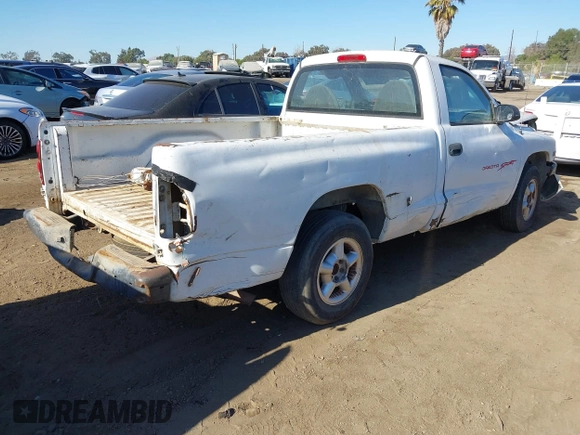 1999 Dodge Dakota SLT with VIN 1B7FL26X1XS190195, listed as a IAAI auction lot 41355250 with 223,174 mi miles. Bid and sale history available at carsss.com. Image 4.