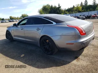 2011 Jaguar XJ with VIN SAJXA2GE5BMV13122, listed as a Copart auction lot 73113044 with 164,196 mi miles and Salvage Title. Bid and sale history available at DreamBid. Image 2.