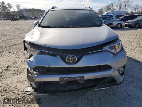 2018 Toyota RAV4 XLE with VIN JTMWFREV9JJ209010, listed as a Copart auction lot 46638075 with 50,553 mi miles and Salvage Title. Bid and sale history available at DreamBid. Image 5.