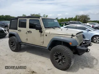 2017 Jeep Wrangler Unlimited Sport with VIN 1C4BJWDG5HL670282, listed as a Copart auction lot 52332905 with 106,022 mi miles and Salvage Title. Bid and sale history available at carsss.com. Image 4.