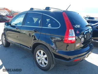 2009 Honda CR-V EX-L with VIN 5J6RE38759L023937, listed as a IAAI auction lot 41736422 with 137,577 mi miles. Bid and sale history available at carsss.com. Image 3.