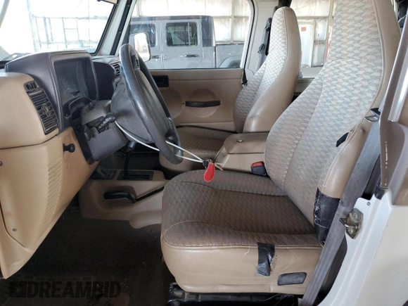 1999 Jeep Wrangler Sport с VIN 1J4FY19S9XP414239, выставлен на аукционе Copart как лот 66882505 с пробегом 131 916 миль миль и Чистый • Clean title. История ставок и продаж доступна на DreamBid. Изображение 7.