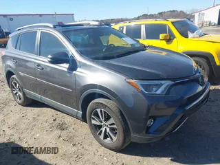 2018 Toyota RAV4 XLE with VIN JTMWFREV9JJ200629, listed as a IAAI auction lot 41821491 with 184,706 mi miles. Bid and sale history available at carsss.com. Image 1.