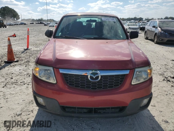 2011 Mazda Tribute Touring with VIN 4F2CY0C7XBKM00671, listed as a Copart auction lot 75431144 with 140,748 mi miles and Clean Title. Bid and sale history available at carsss.com. Image 5.