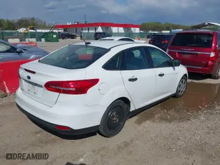 2016 Ford Focus S with VIN 1FADP3E2XGL357547, listed as a IAAI auction lot 42037636 with 254,349 mi miles. Bid and sale history available at carsss.com. Image 4.