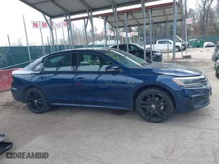 2021 Volkswagen Passat 2.0T R-Line with VIN 1VWMA7A35MC018415, listed as a IAAI auction lot 41908608 with 61,669 mi miles. Bid and sale history available at carsss.com. Image 13.