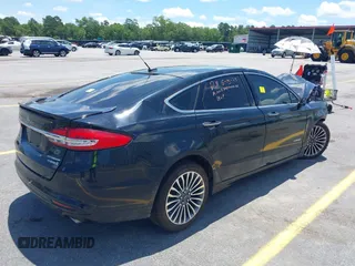 2018 Ford Fusion Titanium with VIN 3FA6P0RU8JR101306, listed as a IAAI auction lot 42542847 with 193,874 mi miles and . Bid and sale history available at DreamBid. Image 4.