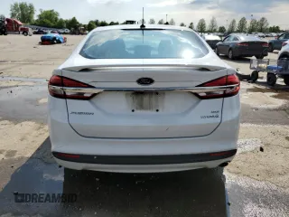 2018 Ford Fusion SE z VIN 3FA6P0LU5JR248594, wystawiony jako Copart lot #56056775 z przebiegiem Nie podano mil oraz Szkoda całkowita • Salvage title. Historia ofert i sprzedaży dostępna na DreamBid. Obrazek 6.