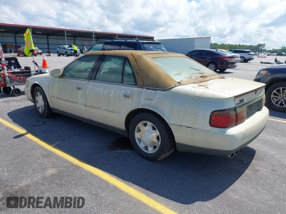 2001 Cadillac Seville Luxury SLS z VIN 1G6KS54Y81U110047, wystawiony jako IAAI lot #42436746 z przebiegiem 107 360 mil mil oraz . Historia ofert i sprzedaży dostępna na DreamBid. Obrazek 3.