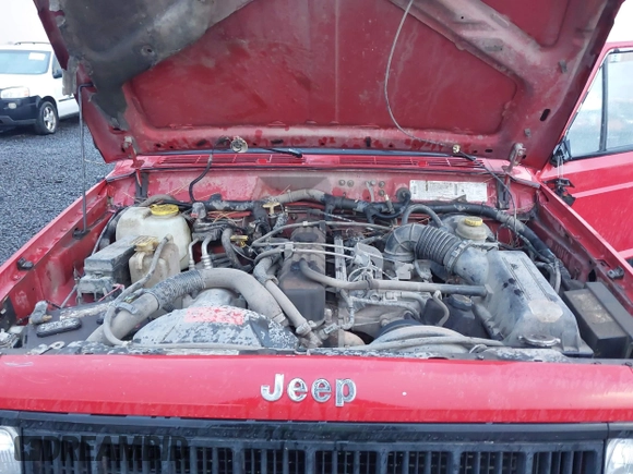 1996 Jeep Cherokee Sport with VIN 1J4FJ68S4TL244893, listed as a IAAI auction lot 41190369 with 192,459 mi miles and . Bid and sale history available at DreamBid. Image 10.