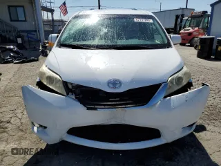 2012 Toyota Sienna LE AAS z VIN 5TDKK3DC8CS241301, wystawiony jako Copart lot #62791895 z przebiegiem 167 439 mil mil oraz Szkoda całkowita • Salvage title. Historia ofert i sprzedaży dostępna na DreamBid. Obrazek 5.