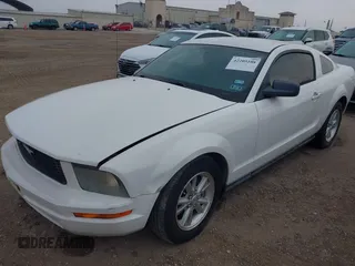 2007 Ford Mustang Deluxe with VIN 1ZVFT80N875359456, listed as a IAAI auction lot 42205108 with 75,588 mi miles and . Bid and sale history available at carsss.com. Image 2.
