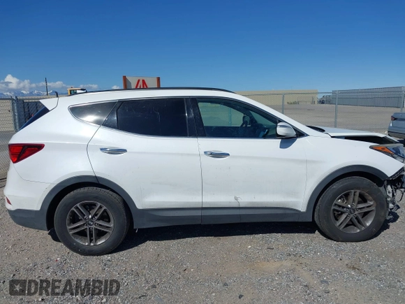 2017 Hyundai Santa Fe 2.4L z VIN 5NMZU3LB1HH045714, wystawiony jako IAAI lot #41949139 z przebiegiem 151 799 mil mil oraz . Historia ofert i sprzedaży dostępna na DreamBid. Obrazek 13.