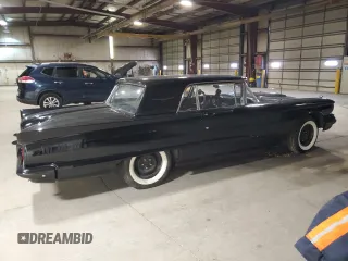 1960 Ford Thunderbird with VIN 0Y71Y188635, listed as a Copart auction lot 49905725 with 1,414 mi miles and Salvage Title. Bid and sale history available at DreamBid. Image 3.