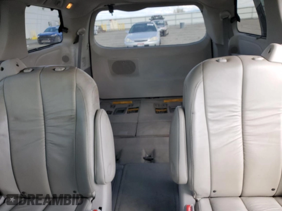 2011 Toyota Sienna XLE with VIN 5TDDK3DC2BS028058, listed as a Copart auction lot 54374215 with 216,905 mi miles and Salvage Title. Bid and sale history available at DreamBid. Image 10.