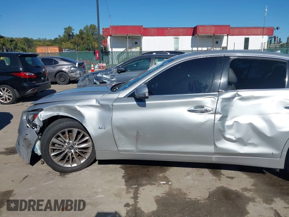 2020 Infiniti Q50 Luxe with VIN JN1EV7AR6LM256477, listed as a IAAI auction lot 40631166 with 89,908 mi miles and . Bid and sale history available at DreamBid. Image 17.