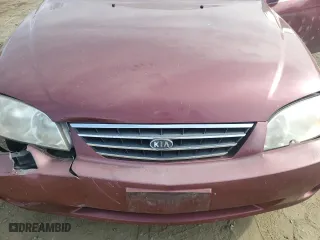 2003 Kia Spectra with VIN KNAFB121935241589, listed as a Copart auction lot 71933194 with 61,738 mi miles and Salvage Title. Bid and sale history available at carsss.com. Image 11.