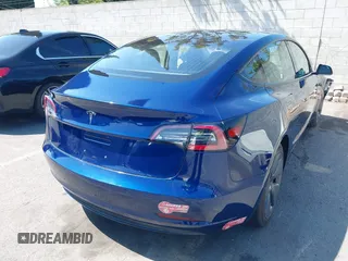 2018 Tesla Model 3 Long Range Battery with VIN 5YJ3E1EA1JF014630, listed as a IAAI auction lot 41877296 with 137,294 mi miles and . Bid and sale history available at DreamBid. Image 4.