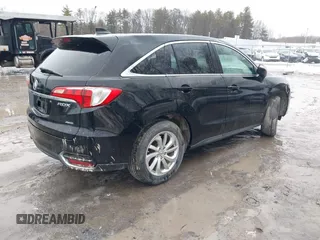 2016 Acura RDX with VIN 5J8TB4H38GL015305, listed as a IAAI auction lot 41672385 with 121,623 mi miles. Bid and sale history available at carsss.com. Image 4.