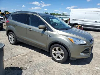 2014 Ford Escape SE z VIN 1FMCU9GXXEUA98927, wystawiony jako Copart lot #58134135 z przebiegiem 140 711 mil mil oraz Czysty tytuł • Clean title. Historia ofert i sprzedaży dostępna na DreamBid. Obrazek 4.