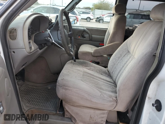 2003 GMC Safari z VIN 1GKDM19XX3B513779, wystawiony jako Copart lot #80021574 z przebiegiem 188 737 mil mil oraz Szkoda całkowita • Salvage title. Historia ofert i sprzedaży dostępna na DreamBid. Obrazek 7.