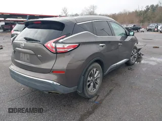 2016 Nissan Murano Platinum with VIN 5N1AZ2MG6GN106877, listed as a IAAI auction lot 41447698 with 124,451 mi miles and . Bid and sale history available at DreamBid. Image 4.