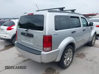 2010 Dodge Nitro SE z VIN 1D4PU2GK4AW146358, wystawiony jako IAAI lot #42299592 z przebiegiem 153 774 mil mil oraz . Historia ofert i sprzedaży dostępna na DreamBid. Obrazek 4.