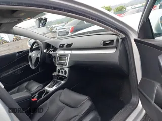 2009 Volkswagen Passat z VIN WVWXK73C69E027467, wystawiony jako IAAI lot #42277275 z przebiegiem 145 956 mil mil oraz . Historia ofert i sprzedaży dostępna na DreamBid. Obrazek 5.