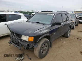 1999 Isuzu Rodeo S with VIN 4S2CM58W4X4339262, listed as a Copart auction lot 82804154 with 177,097 mi miles and Salvage Title. Bid and sale history available at carsss.com. Image 1.