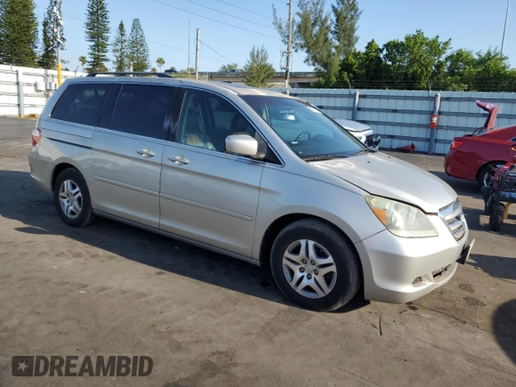 2007 Honda Odyssey EX-L z VIN 5FNRL38697B039741, wystawiony jako Copart lot #56868365 z przebiegiem 135 742 mil mil oraz Czysty tytuł • Clean title. Historia ofert i sprzedaży dostępna na DreamBid. Obrazek 4.