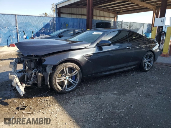 2015 BMW M6 z VIN WBSLX9C59FD160716, wystawiony jako Copart lot #47144925 z przebiegiem 55 535 mil mil oraz Szkody całkowita. Historia ofert i sprzedaży dostępna na DreamBid. Obrazek 1.