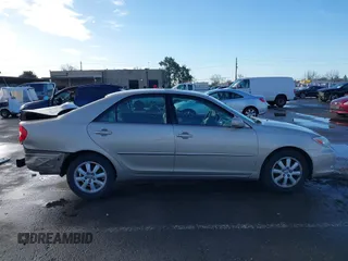2004 Toyota Camry LE with VIN 4T1BF30K24U577908, listed as a IAAI auction lot 41591147 with 151,678 mi miles and . Bid and sale history available at DreamBid. Image 14.