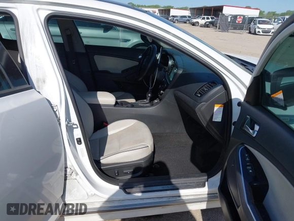 2015 Kia Optima Hybrid EX with VIN KNAGN4AD0F5085164, listed as a IAAI auction lot 41940584 with 129,841 mi miles. Bid and sale history available at carsss.com. Image 5.