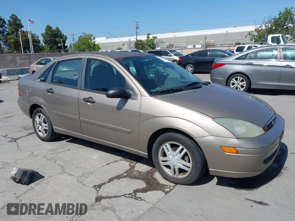 2004 Ford Focus SE with VIN 1FAFP34354W103841, listed as a IAAI auction lot 42099046 with 112,231 mi miles and . Bid and sale history available at DreamBid. Image 1.