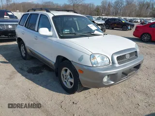 2002 Hyundai Santa Fe GLS with VIN KM8SC73D32U249942, listed as a IAAI auction lot 41660482 with 151,164 mi miles. Bid and sale history available at carsss.com. Image 1.