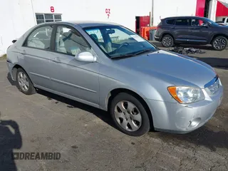 2006 Kia Spectra EX with VIN KNAFE121165243168, listed as a IAAI auction lot 41423980 with 101,432 mi miles. Bid and sale history available at carsss.com. Image 1.