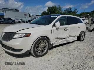 2013 Lincoln MKT EcoBoost with VIN 2LMHJ5AT4DBL55246, listed as a Copart auction lot 77341944 with 120,267 mi miles and Salvage Title. Bid and sale history available at carsss.com. Image 1.
