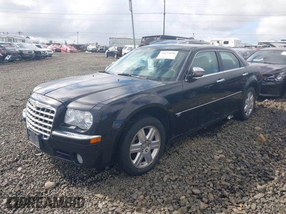 2006 Chrysler 300 C with VIN 2C3LK63H66H437280, listed as a IAAI auction lot 41615050 with 209,303 mi miles. Bid and sale history available at carsss.com. Image 2.